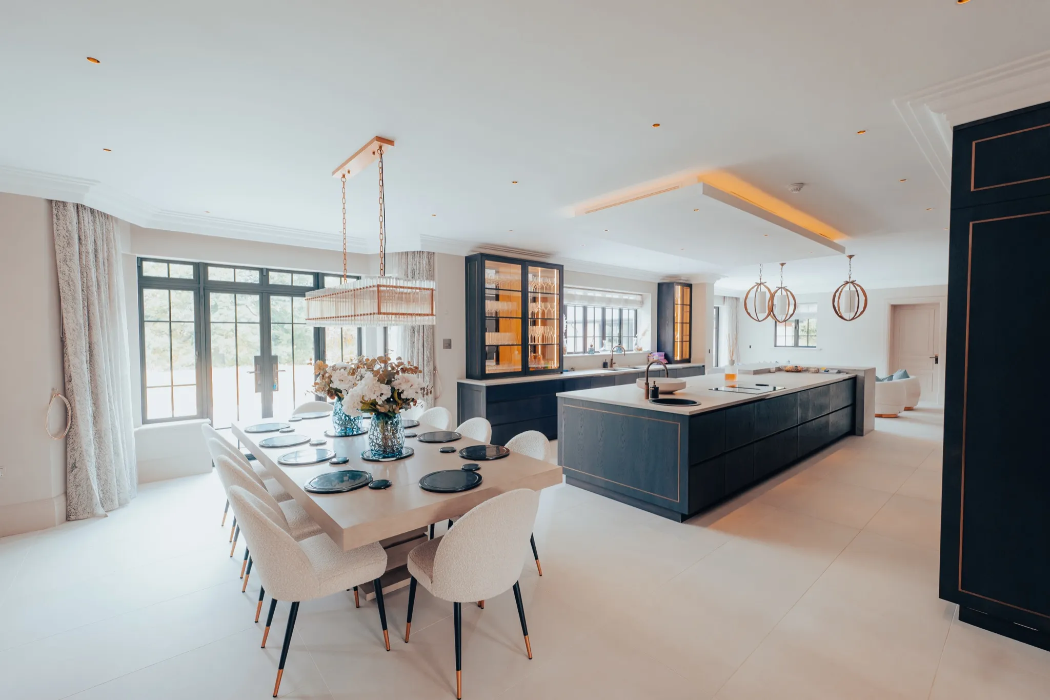 Elegant dining room with designer lighting