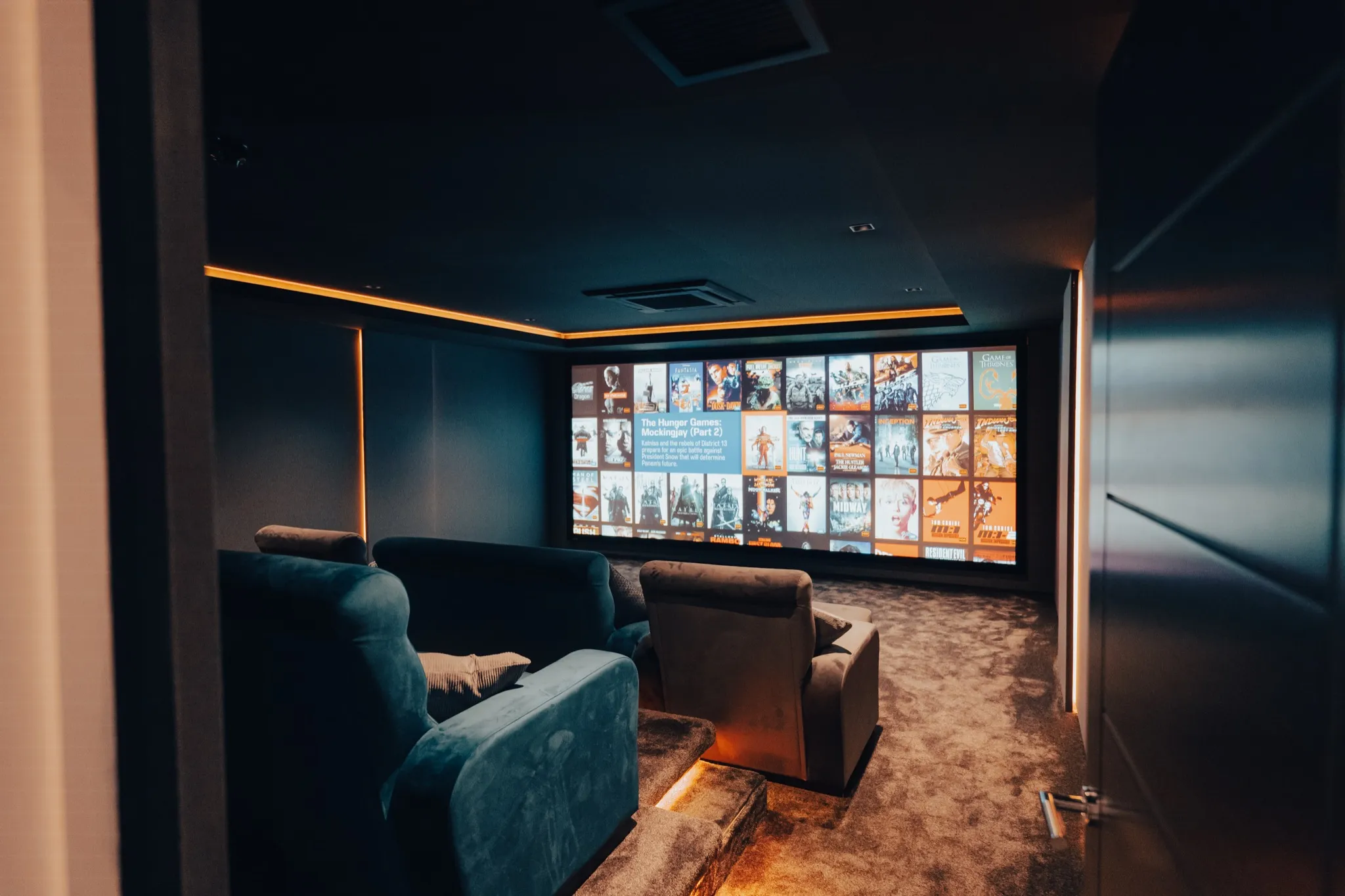 Private home cinema with immersive screen